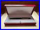 Cartier-Diabolo-Lacquer-Twist-Ballpoint-Pen-Black-Resin-Gold-Trim-01-uq